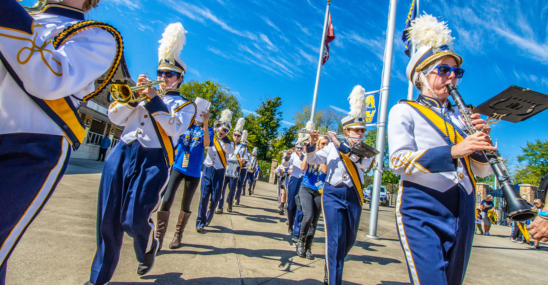 MSJ marching band outside playing trumpets