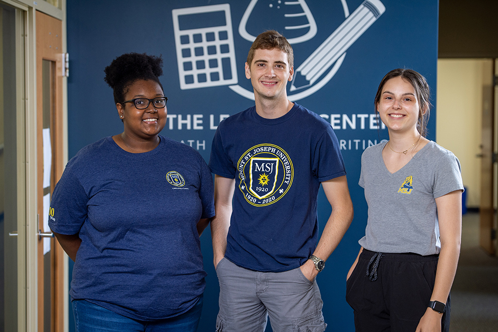 learning center students by wall logo