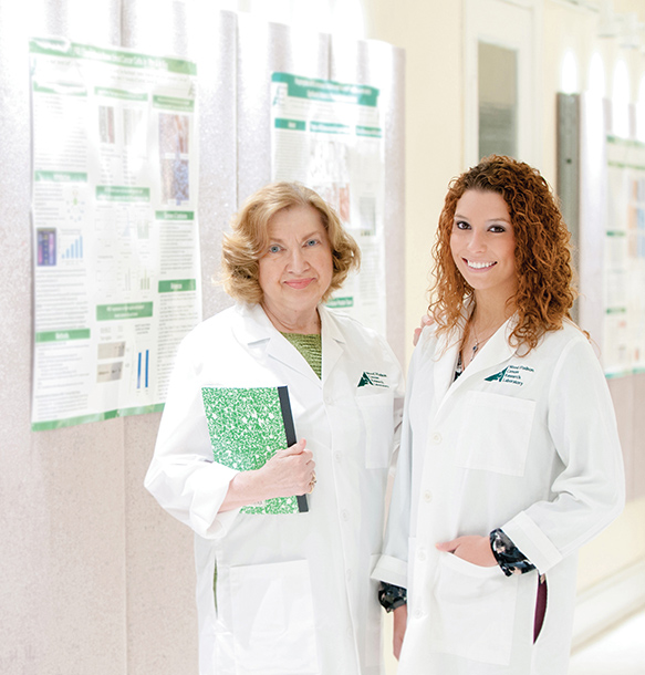 MSJ female student in white lab coat