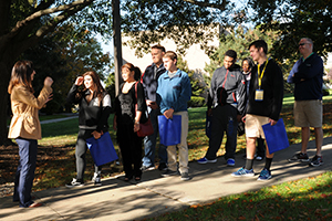 group of students touring the msj quad