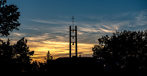 Mount St. Joseph University bell tower during sunset.