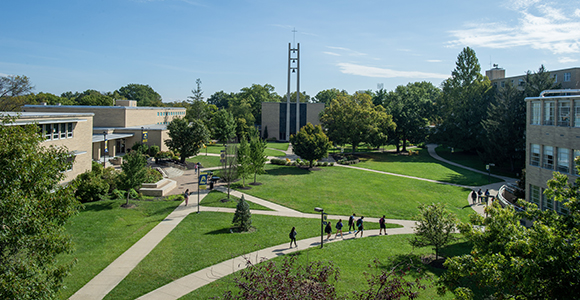 Mount St. Joseph University quad with students walking around.