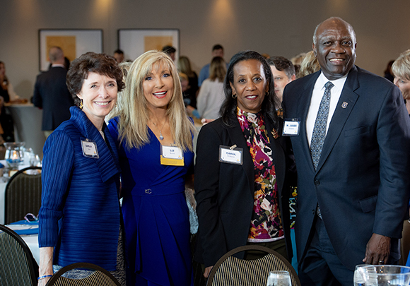 liz bonis standing next to msj president and first lady and dean darla vale