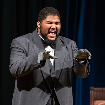 MSJ theatre student on stage scowling during acting