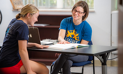 advisor helping student